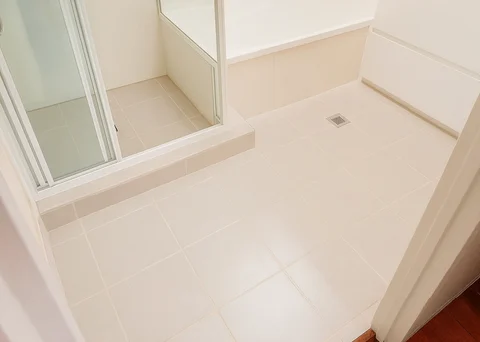 Professional bathroom tiling by Artisan Home Maintenance